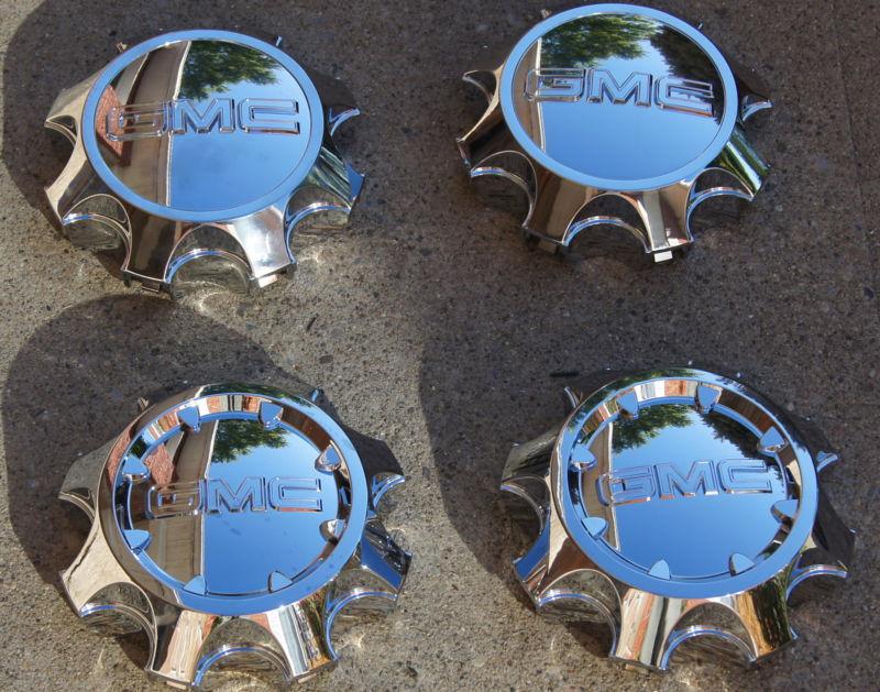 Set of 4  new  gmc sierra 2011 & up 2500 chrome 9597791 center caps hubcaps