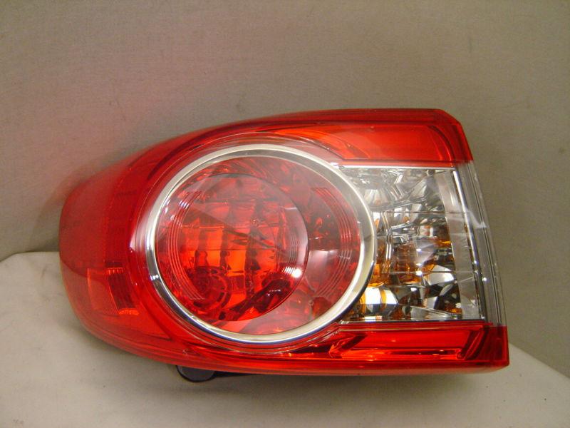 Toyota corolla left tail light 11 12 oem