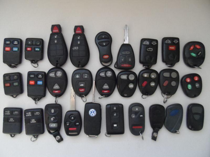 Unique lot of 28 oem keyless remotes gm ford chrysler hyundai vw honda toyota