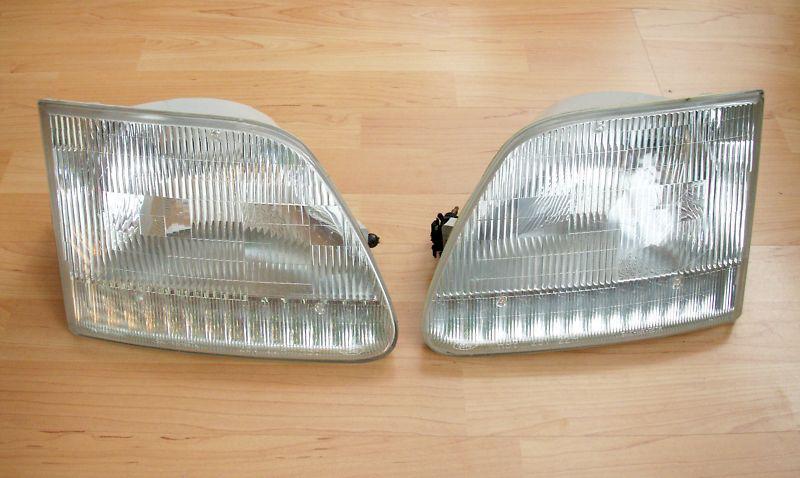 Oem genuine ford 97-up expedition f150 f250 left right front head lights lamps