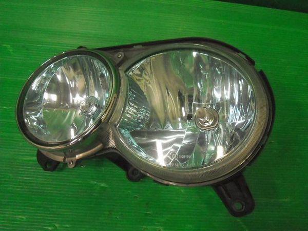 Daihatsu move 2000 left head light assembly [0310900]