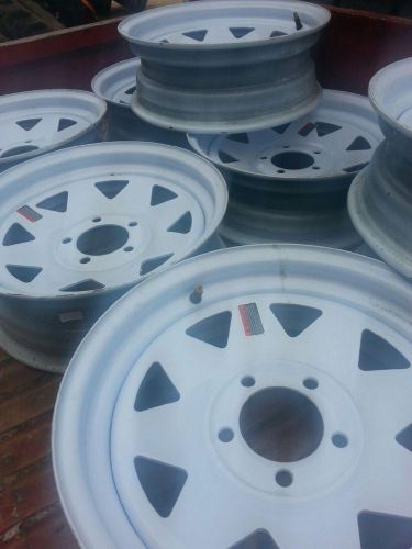 Eight new changeovers 15 inch 5 on 4 1/2  bolt pattern  trailer wheels