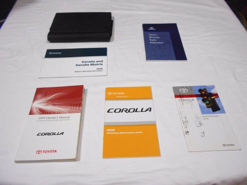 2009 toyota corolla owner&#039;s manual 5/pc set  &amp; black toyota premium  case