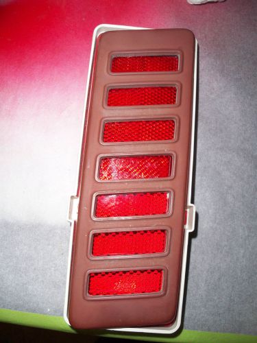 70 impala/caprice nos left rear side marker lamp and bezel.