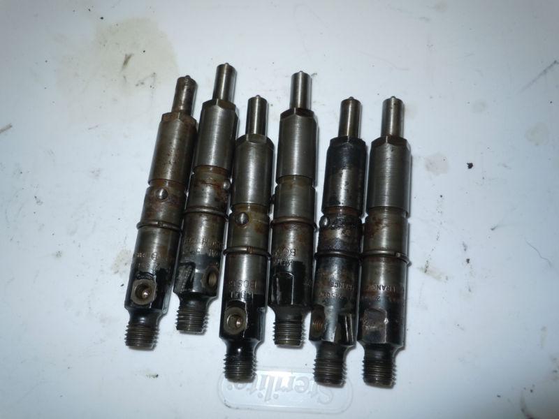 Used 89 dodge 5.9l cummins injectors non intercooled small top 