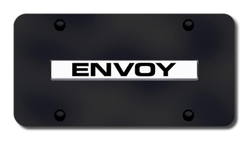 Gm envoy name chrome on black license plate made in usa genuine