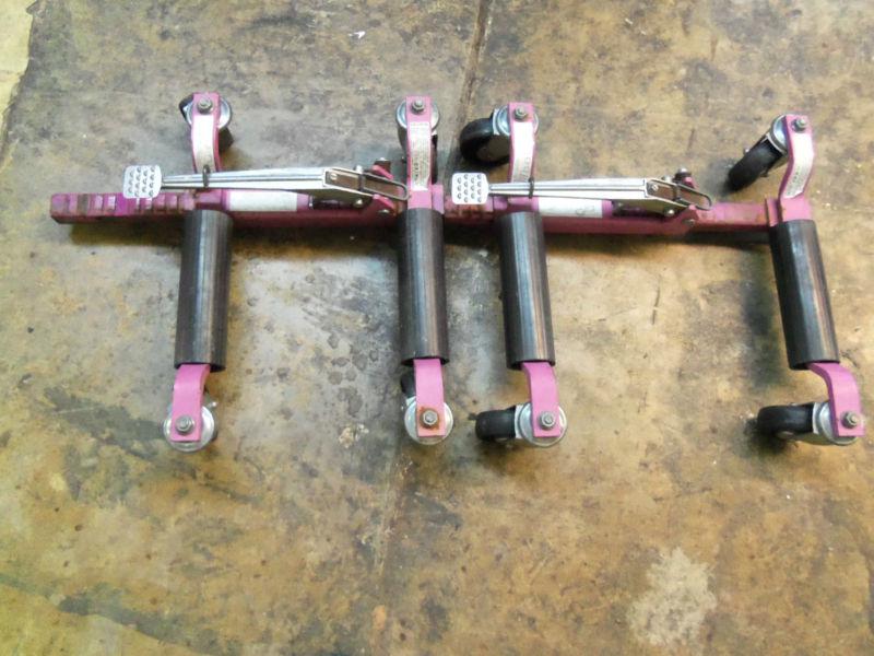 Pair of gojak 5000 rolling car jack/ dollies