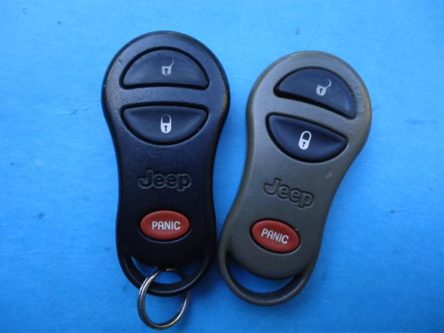 2  99-04 jeep grand cherokee keyless remote set 56036859 56036860 gq43vt9t oem