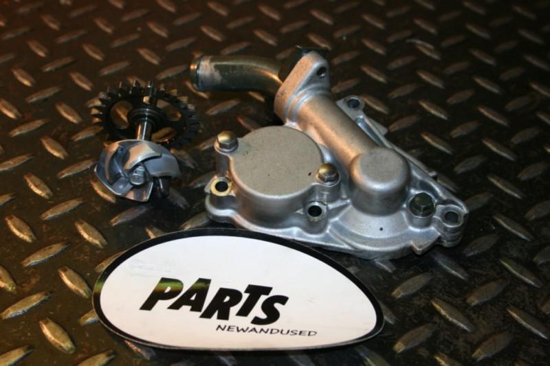 2005 kawasaki kx250f kx 250f water/oil pump with cover/gear/impeller 