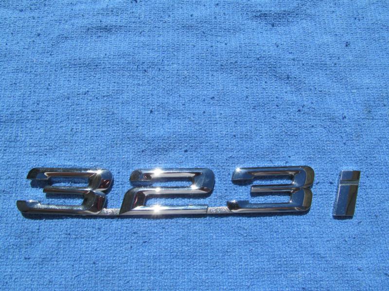 Bmw 323 i 1995-1998 rear trunk emblem  oem 