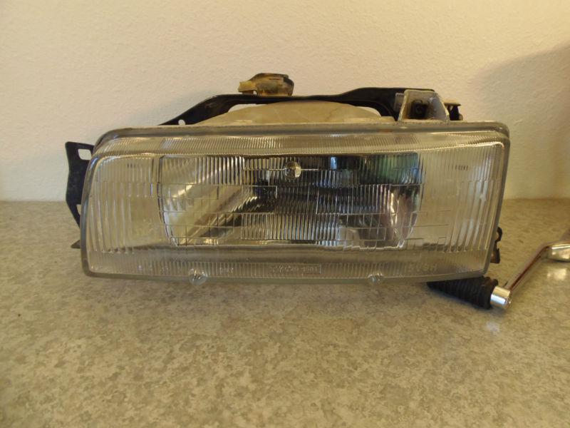 Toyota corolla sdn left passenger headlight bracket 88 89 90 91 92 used