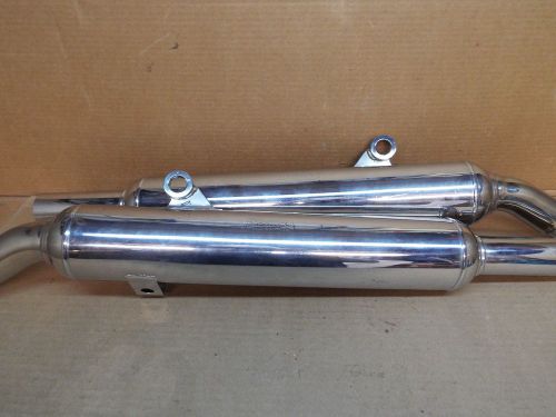 Pair of staintune chrome mufflers possibly triumph