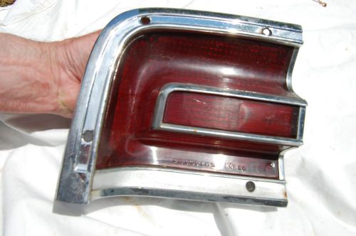 1967 fury tail light with housing used 2606321