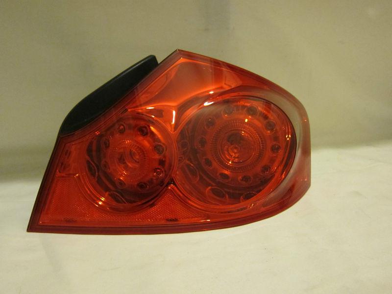 2007-2012 infiniti g35 sedan used oem right (passenger) side tail light