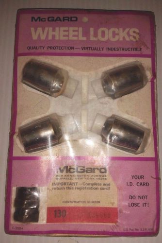 Nos new mcgard chrome wheel lock set:4 wheel lugs &amp; 1 key lug 1965-77