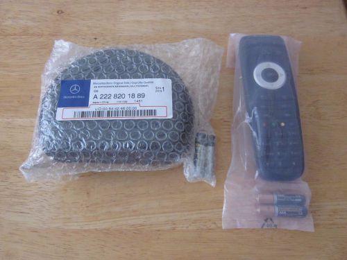 New mercedes oem dvd (+comand) remote + headphone for rear entertainment system
