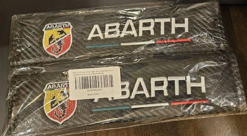 1pair carbon fiber look. abarth letters fender emblem seat belt covers