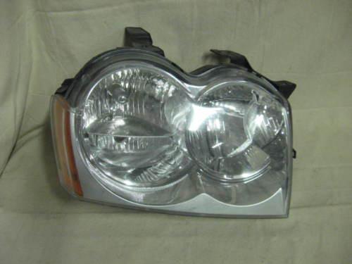 05 06 07 jeep grand cherokee oem right headlight nice!