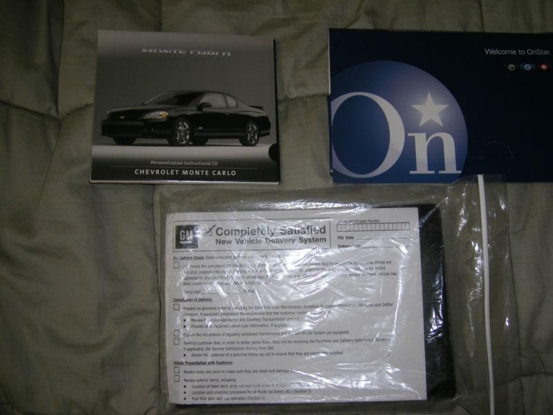 2006 chevrolet monte carlo owner manual 5/pc.set + cd & black chev.factory case.