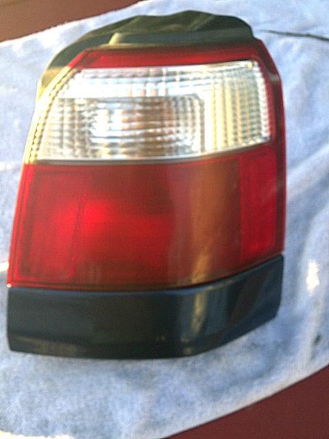 2001 2002 forester tail light assembly complete rh black mldg.