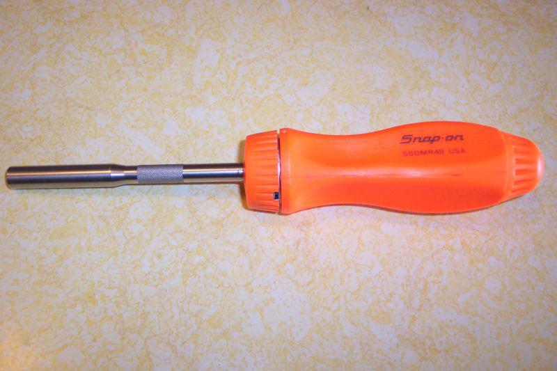 Snap-on   ratcheting orange screwdriver  - nice