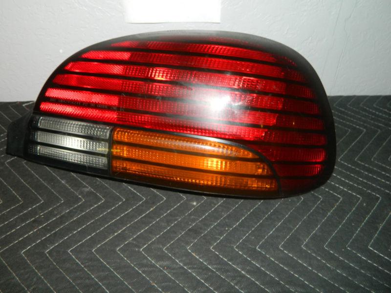 Oem 1996-1998 pontiac grand am right  / passenger side tail light assembly