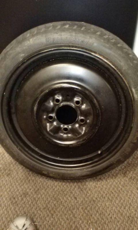 Nissan maxima 95 spare tire