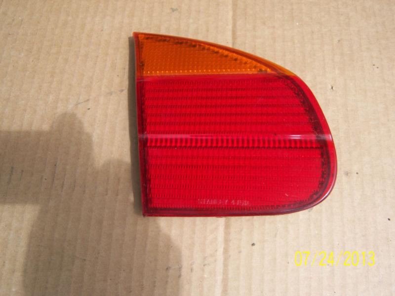 2000 chevy prizm left side trunk tail light reflector