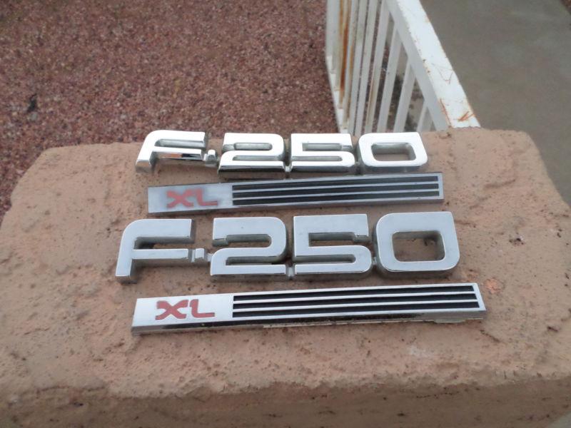 1987-91 ford f250 & xl  fender emblems (4 pieces)