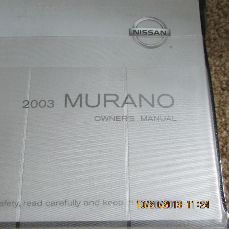 2003 nissan murano owners manual packet.   * used,but nice  *