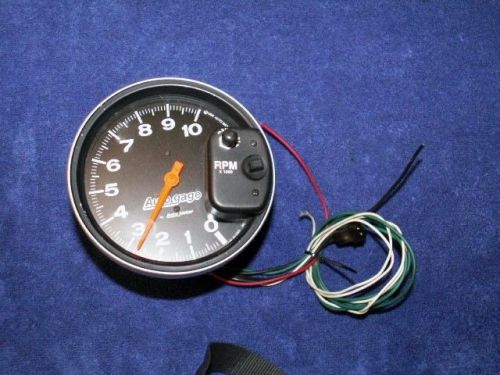 Tachometer auto meter autogage tach 5&#034; 10,000 rpm black face used