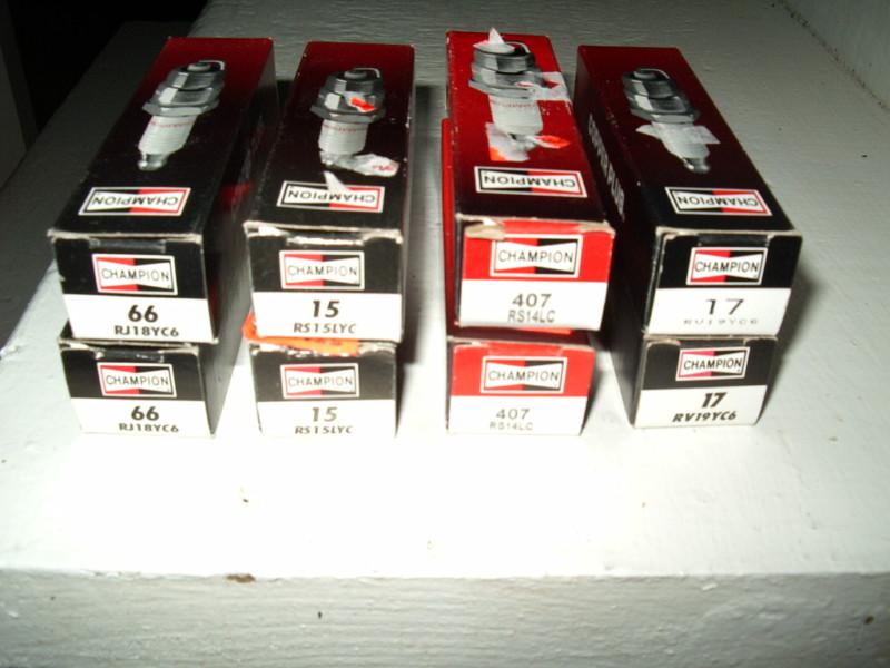 Assorted lot of champion spark plugs 8 total--new