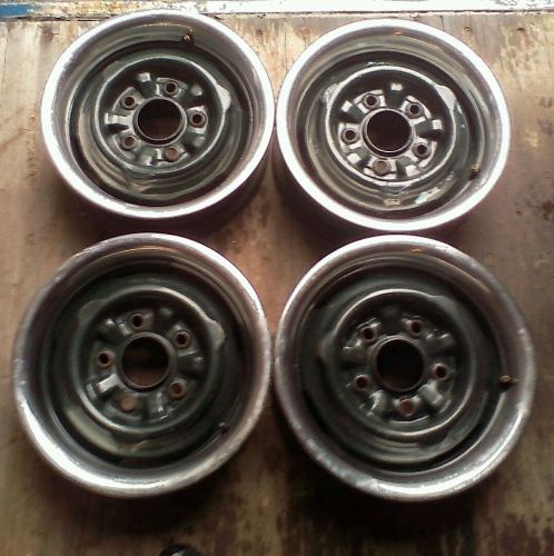 Set (4) 13x5 chevrolet steel rims with trim rings