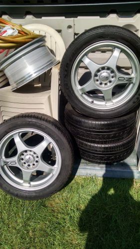 5 oz racing rims with 4 mounted tires