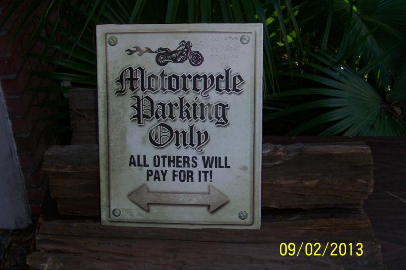 Large metal motorcycle parking only / all others will pay for it sign