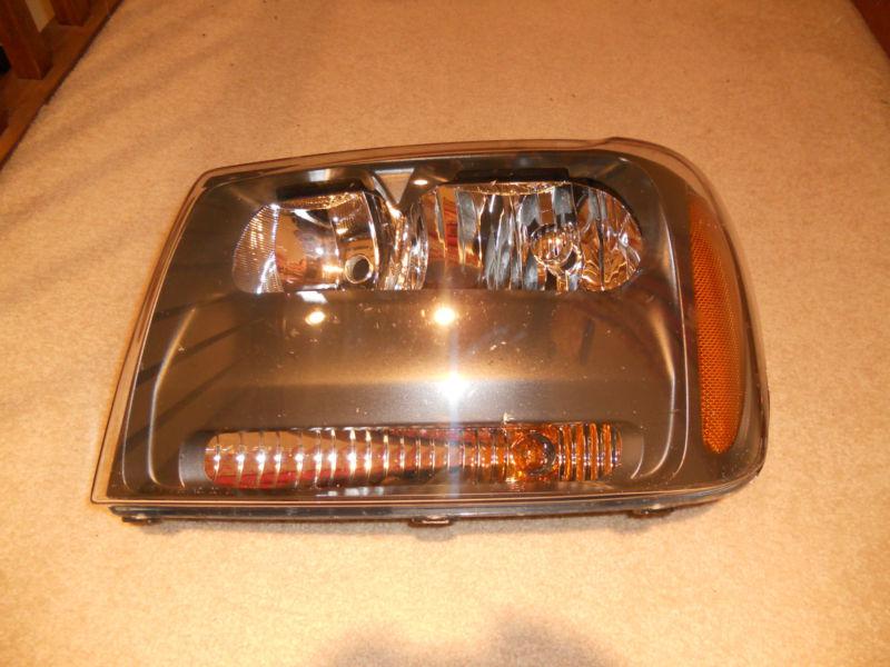 Trailblazer headlight - left side - drivers  side - gm part