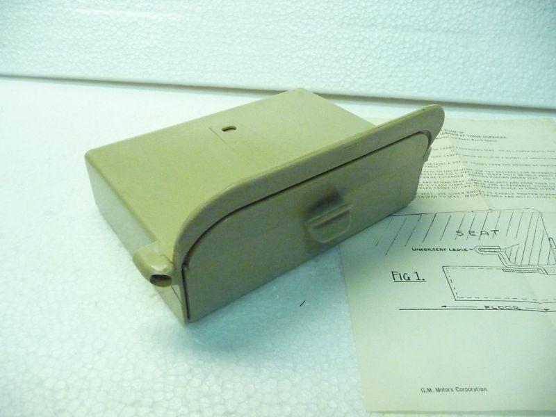 Gm nos under-the-seat tissue dispenser