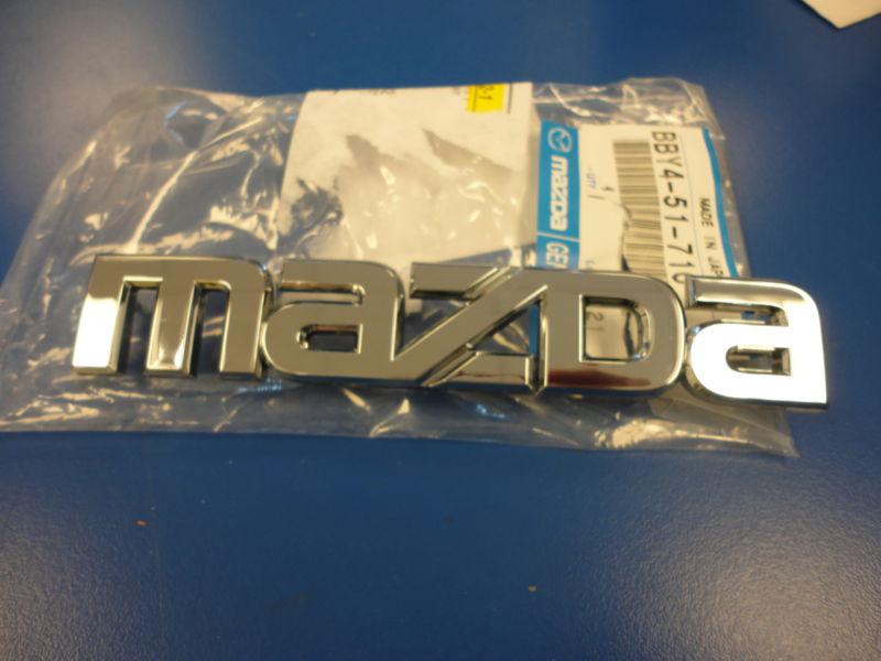 Mazda genuine part...silver emblem bby4-51-710