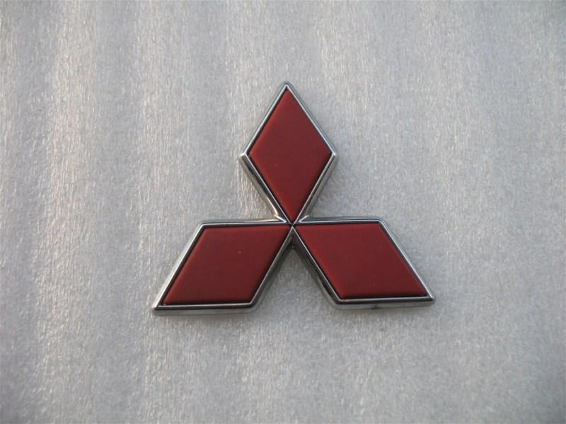 2001 mitsubishi eclipse front bumper emblem logo decal badge oem used 00 01 