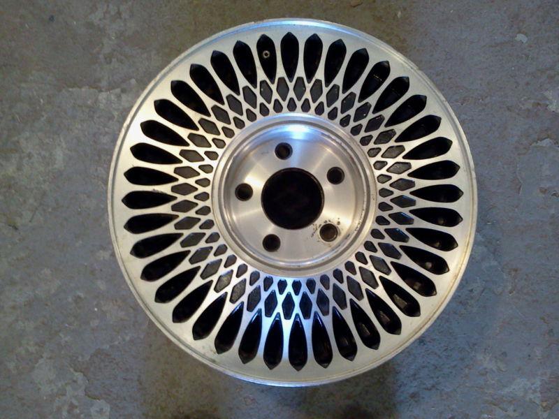 * 15" factory rim - cadillac deville, seville, eldorado - 1985-1993 / w / black