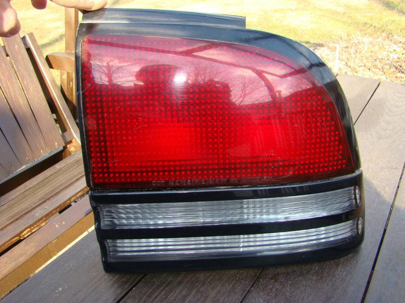 1992 to 1997 olds cutlass supreme right side tail light with backup light 4-door