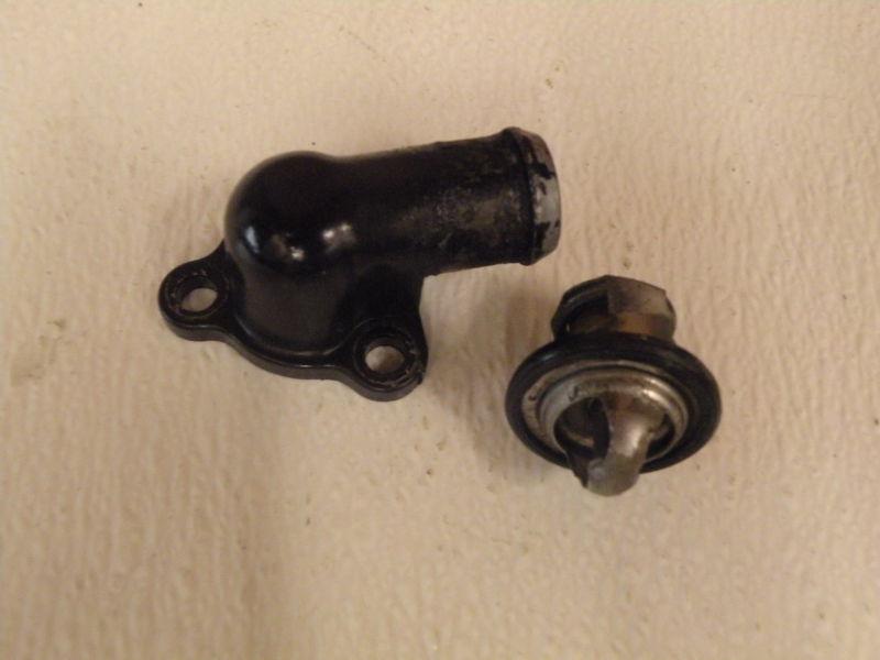 Kawasaki prairie 400 thermostat and housing 4x4