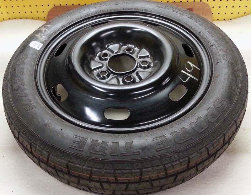 New ford passenger car temporary spare tire 5 lug but no application for sure