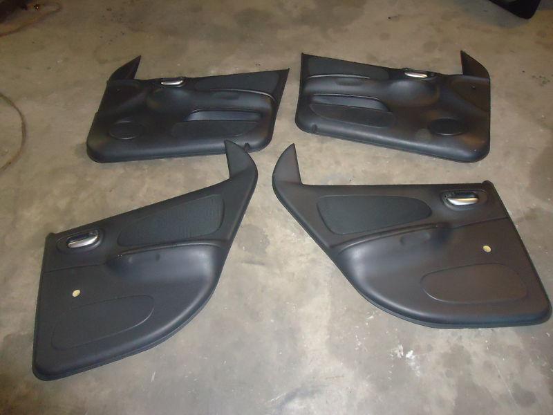 03 04 05 neon srt-4 srt4 front rear door panels cards factory oem set