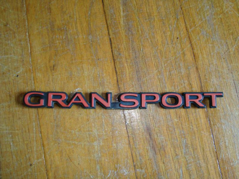 Gran sport door emblem 