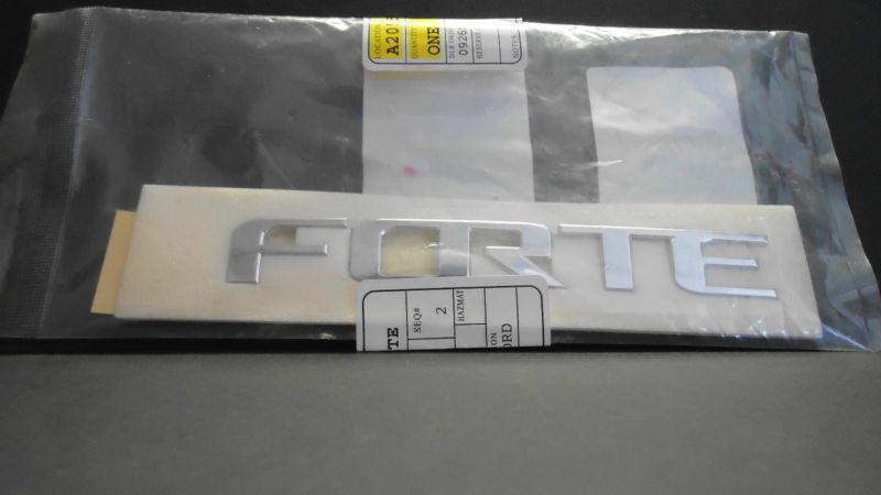 New genuine 2009 - 2012 kia "forte" emblem for deck lid/ hatch part # 863101m000