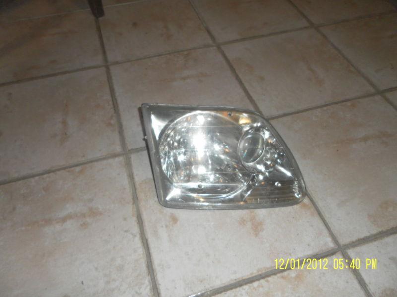 1997-2003 ford f-150 r/headlight lightning w/projector