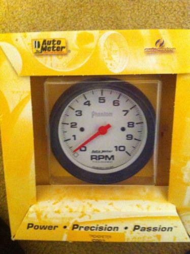 Auto meter tachometer