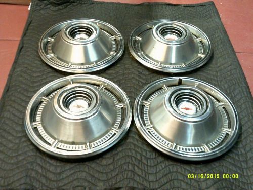 1962-1967 chevy impala hubcaps.set of 4.