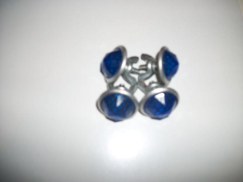  four blue  jeweled faceted reflectors